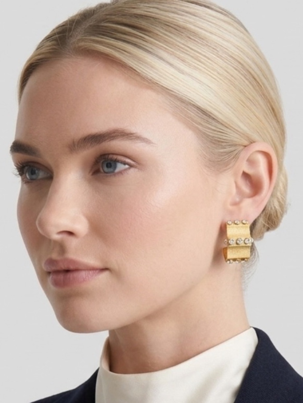 Leru Vintage gold-plated huggie hoops with a sculpted, curved ribbing pattern